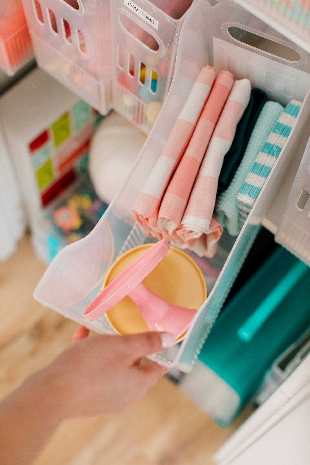 Hand pulling out Kitchen Accessories bin