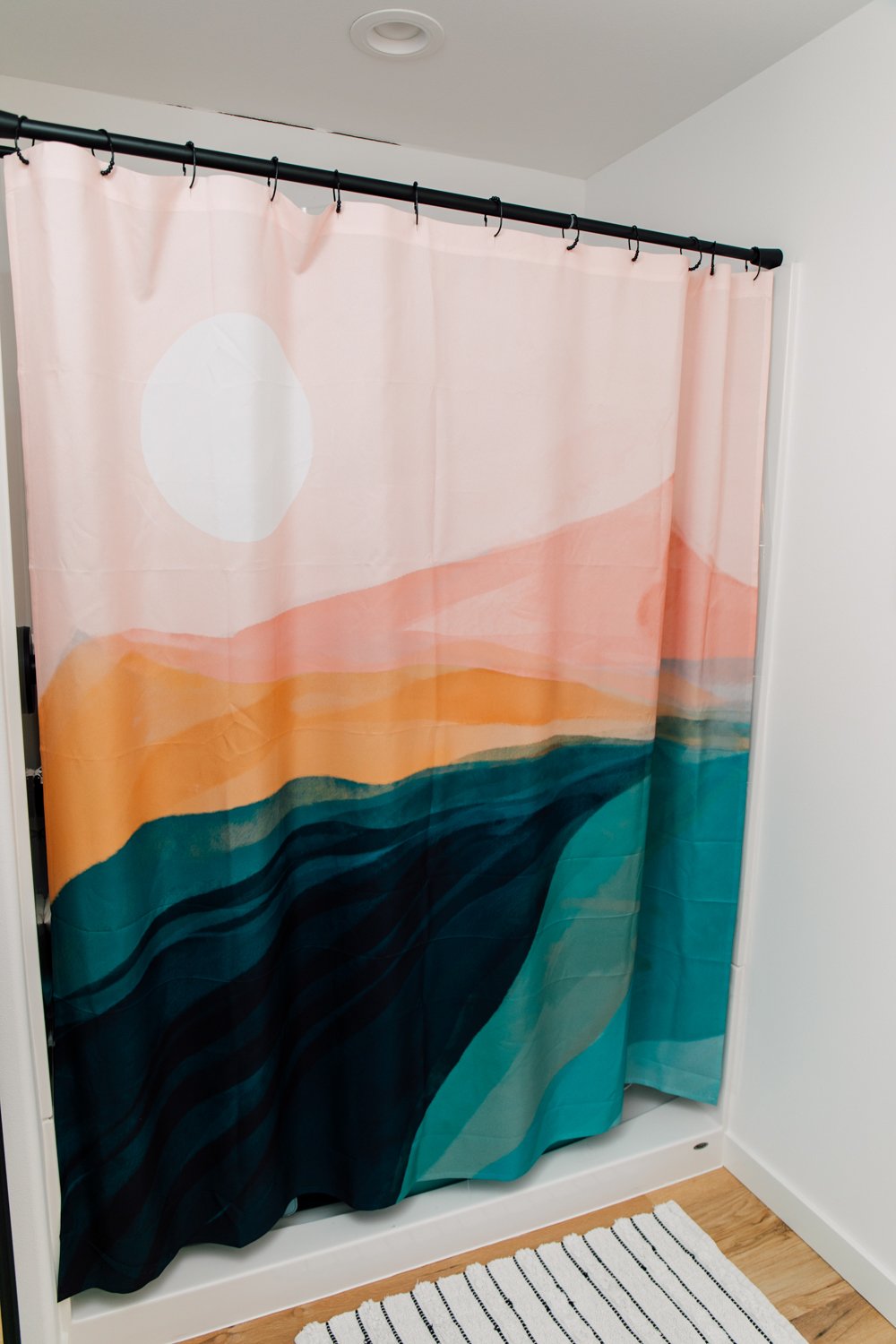 Shower with colorful shower curtain