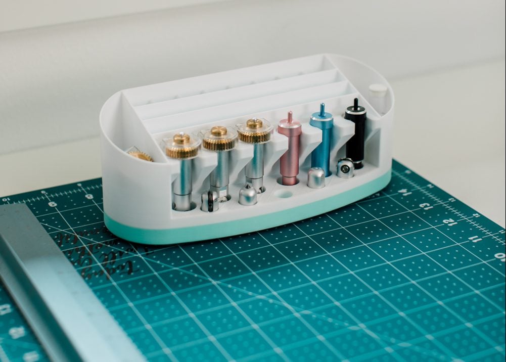 Craft room tour: Closeup of Uniquely Whynot blade organizer with Cricut blades.