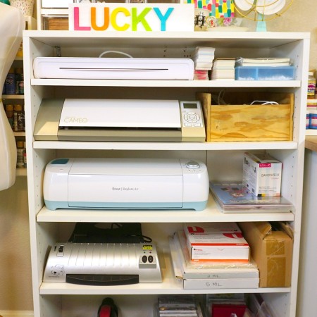 Shelves filled with crafting machines and supplies