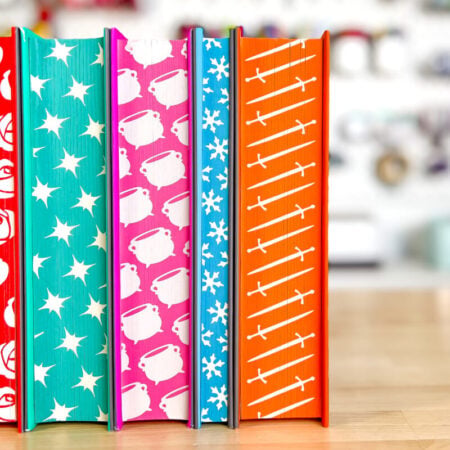 Five ACOTAR books with sprayed edges